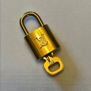 Louis Vuitton brass lock with key, #310